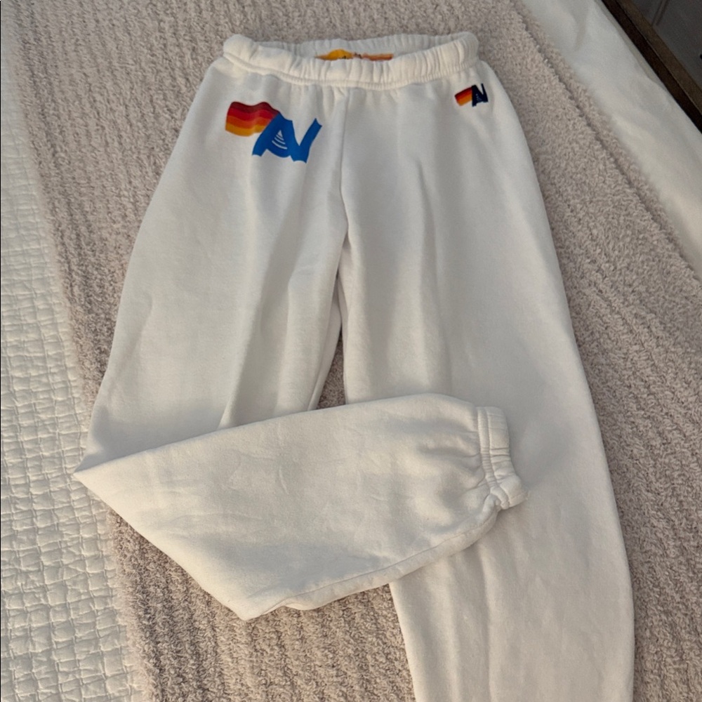 Aviator Nation White Joggers with Rainbow and Blue Logo